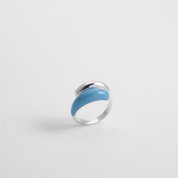 Hand-enameled 925 sterling silver light blue toi et moi open dome ring. Produced in Italy