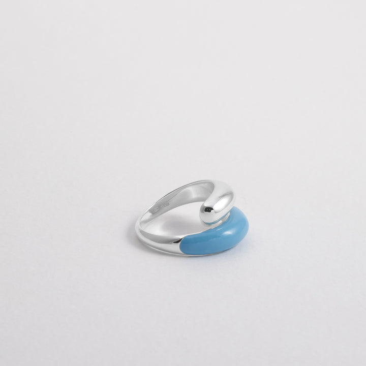 Hand-enameled 925 sterling silver light blue toi et moi open dome ring. Produced in Italy