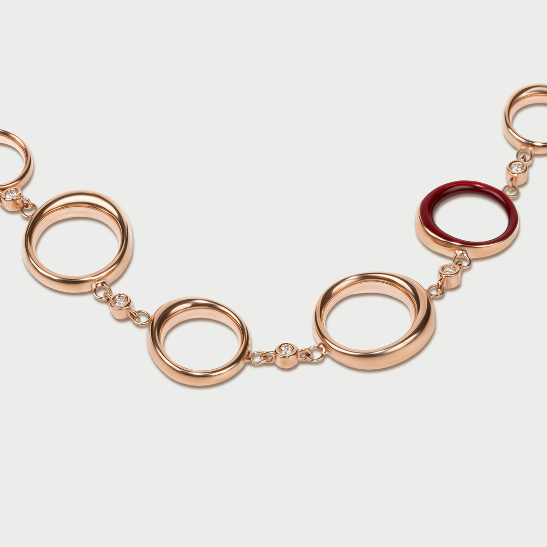 Collana  in oro rosa bombato scultoreo con diamanti lab e smalto rouge  collezione NOVA brand Reveli 