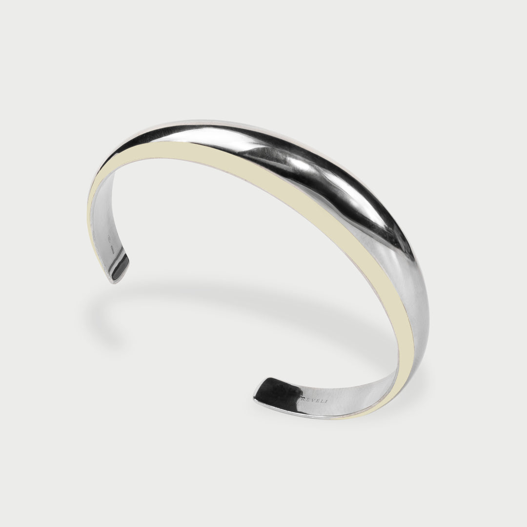 Il bracciale cuff  in argento 925 bombato scultoreo smalto bianco perlato collezione NOVA brand Reveli 