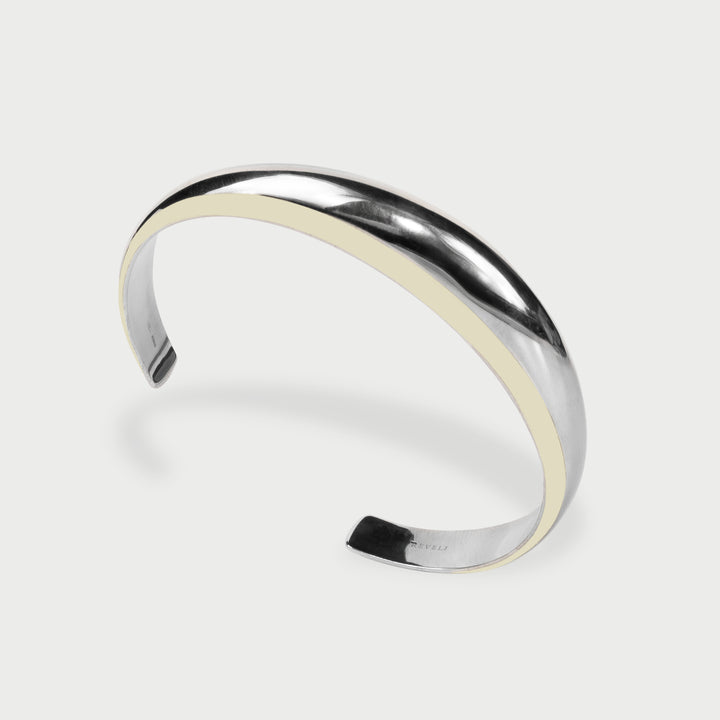 Il bracciale cuff  in argento 925 bombato scultoreo smalto bianco perlato collezione NOVA brand Reveli 