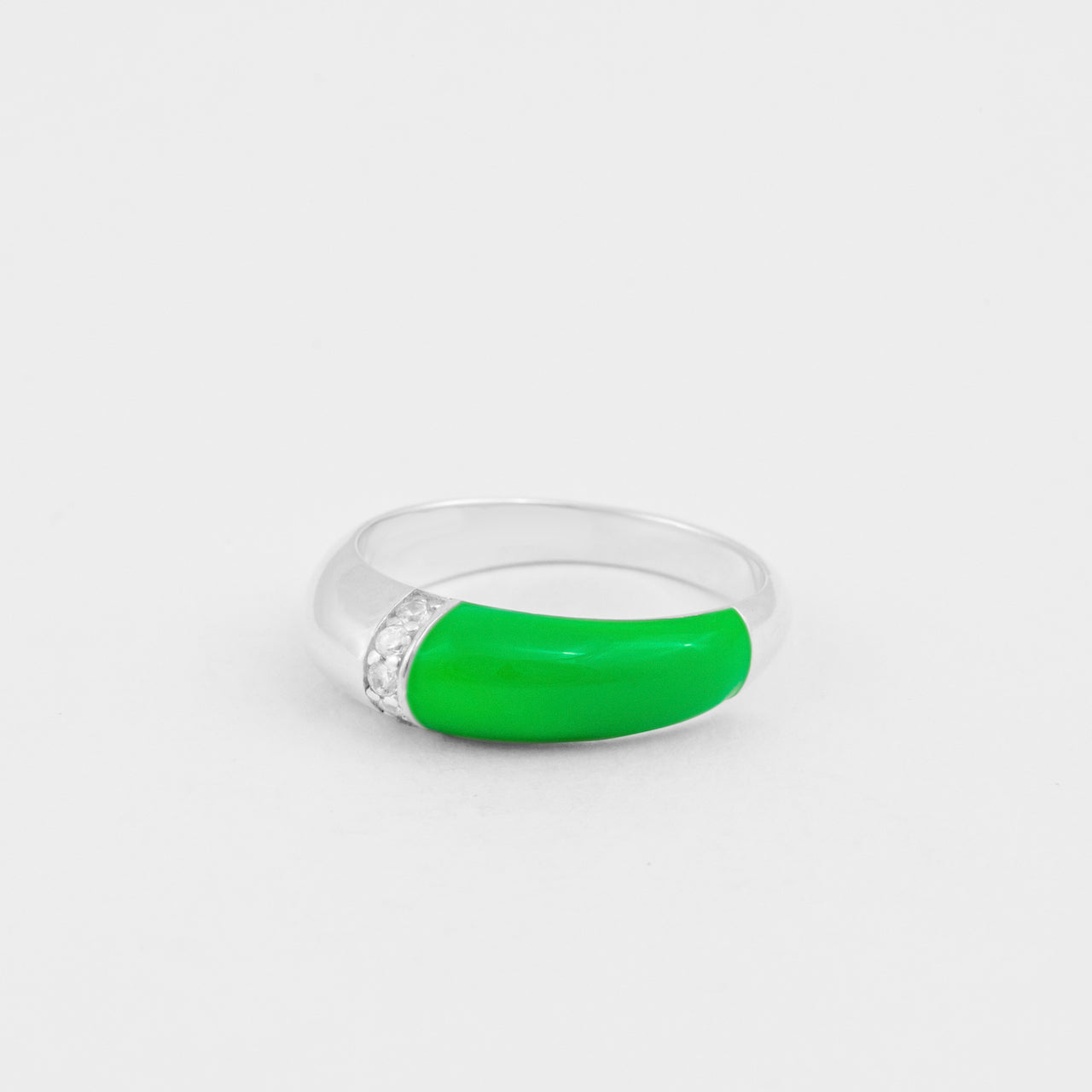 Hand-enameled 925 sterling silver dome ring with neon green enamel and round-cut crystals. Produced in Italy. Réveli