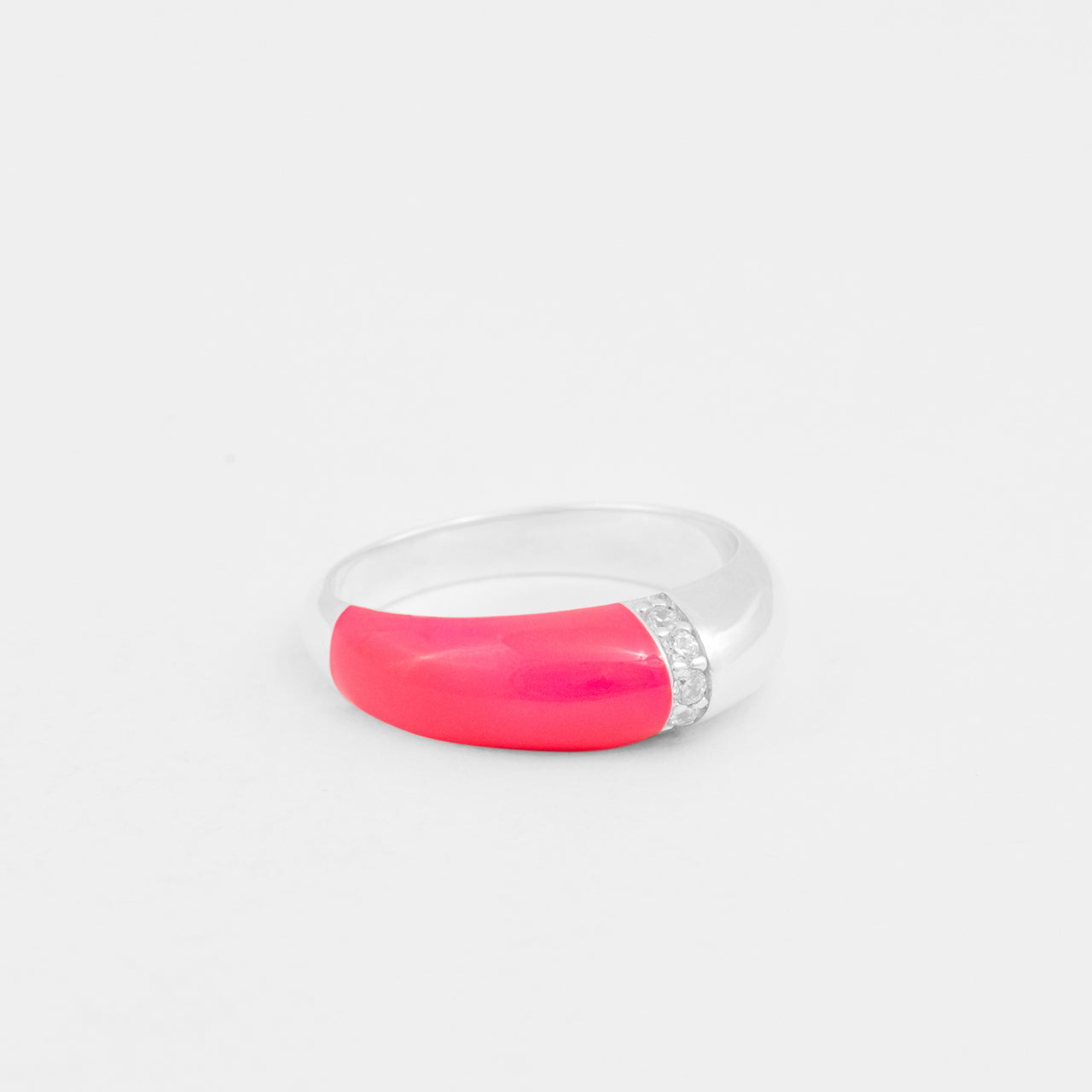 Hand-enameled 925 sterling silver dome ring with neon pink enamel and round-cut crystals. Produced in Italy. Réveli