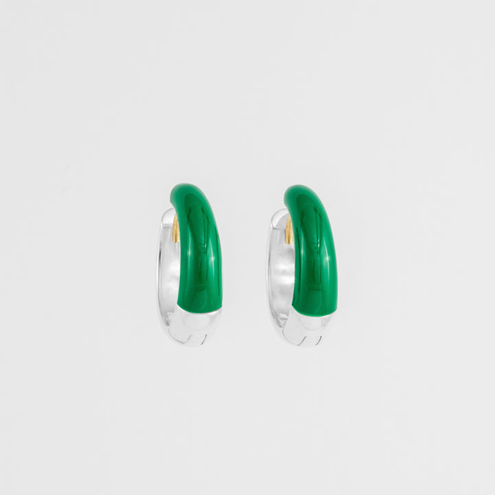 Hand-enameled oval dome earrings in 18K gold and 925 sterling silver and green grass enamel. Produced in Italy. Réveli