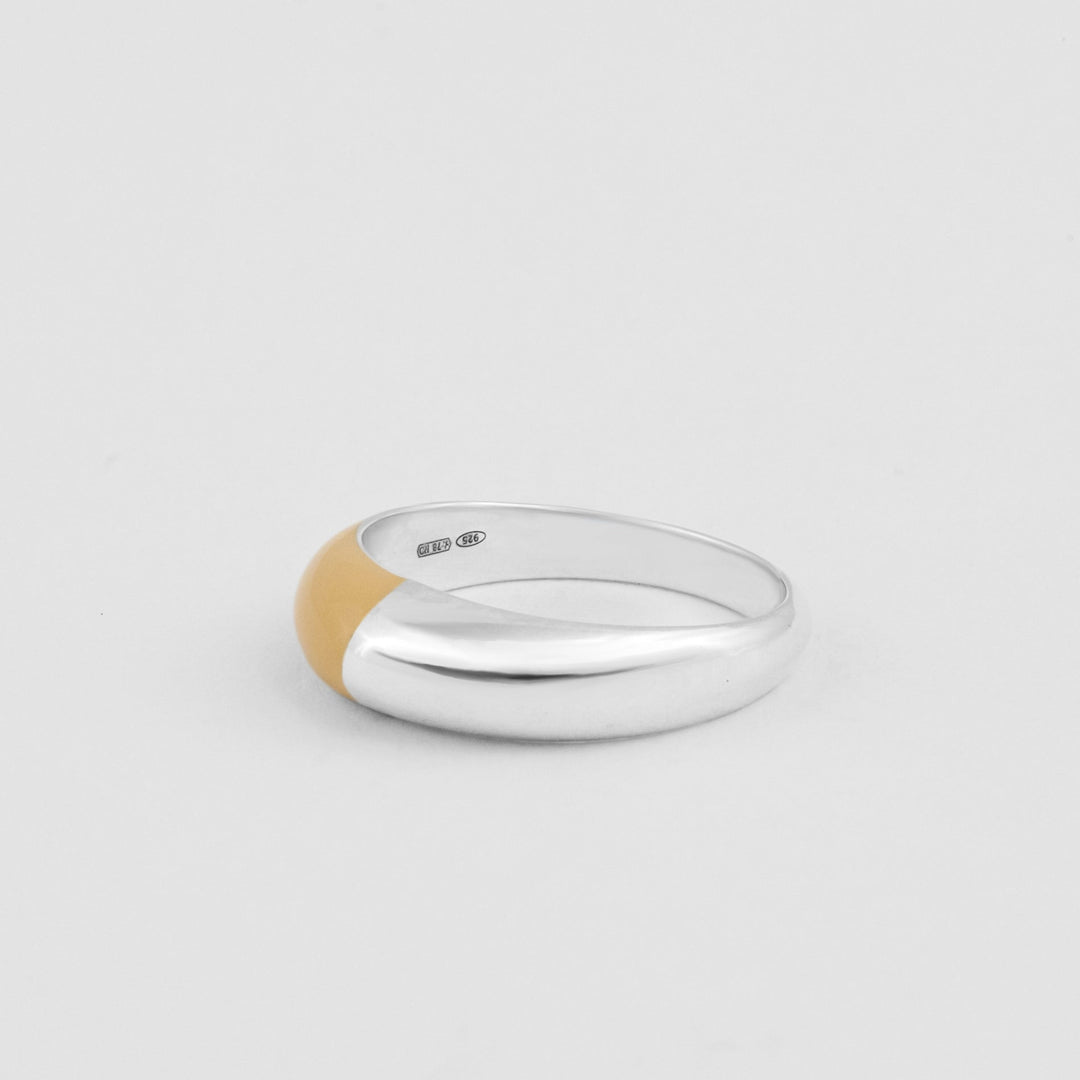 Hand-enameled 925 sterling silver dome ring with tapioca enamel. Produced in Italy. Réveli