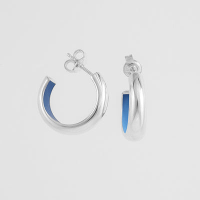 Hand-enameled 925 sterling silver light blue dome earrings. Produced in Italy . Réveli