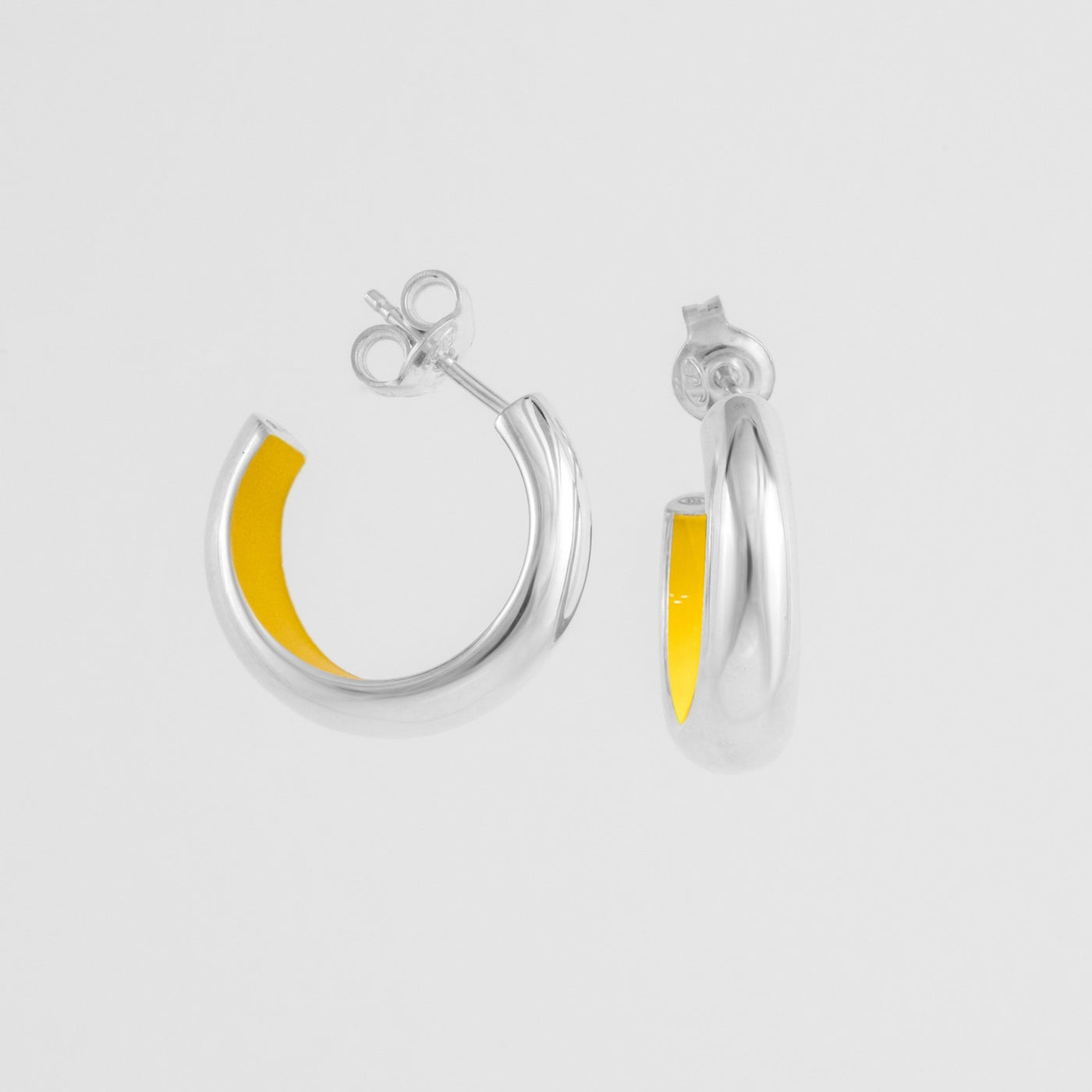 Hand-enameled 925 sterling silver yellow dome earrings. Produced in Italy . Réveli