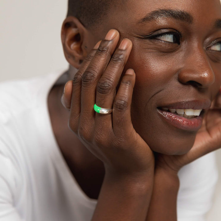 Hand-enameled 925 sterling silver dome ring with neon green enamel. Produced in Italy. Réveli